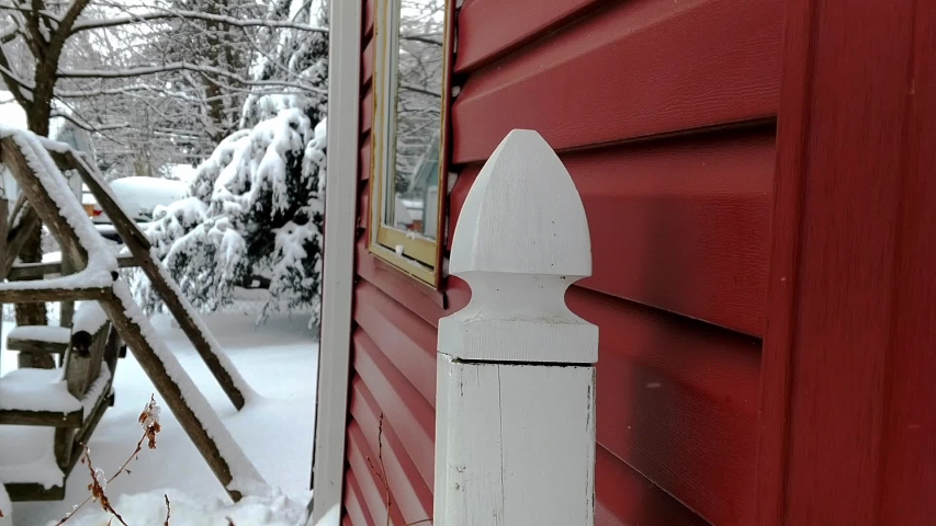 white fence in the snow fall