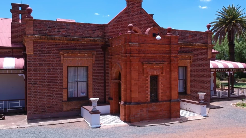 Slide drone view of an old building in South Africa.