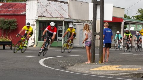 New Plymouth, Taranaki / New Zealand - 01 26 2019: Cyclists in the BDO Around the Mountain Cycle Challenge going through Kaponga