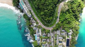 Aerial view slide video of sea beach with resort and road on mountain, Vacation concept