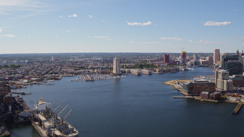 Baltimore Maryland Aerial v8 Flying backward panning around looking at inner harbor cityscape - October 2017