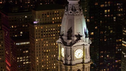 Philadelphia Pennsylvania Aerial v106 Panning birdseye detail of City Hall clock tower mid at night? - October 2017
