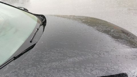 footage of very heavy rain and hail in ski resort in summer