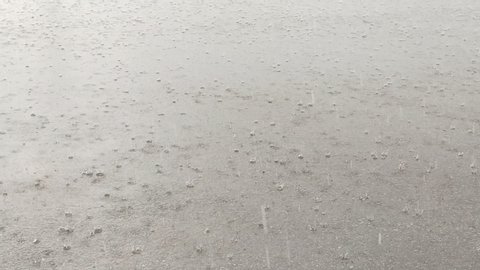 footage of very heavy rain and hail in ski resort in summer