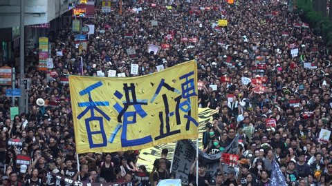 Hong Kong - 16Jun2019: 2 million Hongkongers join protest demonstration on streets against proposed controversial extradition law that will allow transfer of fugitives from HK to China.
