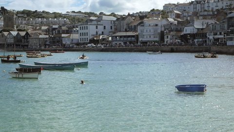 St. Ives, Cornwall, England, June 17 2019. Panoramic view of boats on the bay 