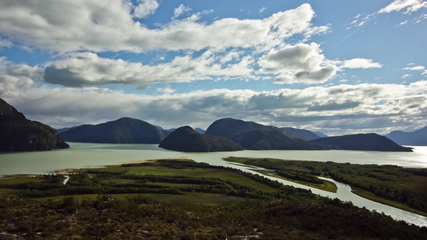 Timelapse of clouds passing over the delta of the Baker river, in Caleta Tortel, one of the last towns in the Carretera Austral, Patagonia, Chile.