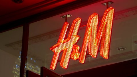 London, United Kingdom (UK) - 02 03 2019: H&M logo during winter night on Regent's Street.