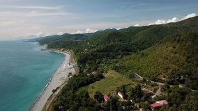 Aerial 4K video. Black sea coastline road near Sochi. Scenic coastal roads in South Russia.