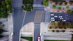 Aerial Video footage of bird view of an road with crowded vehicle in rush hour, Urban cars speeding on the road. taken by drone, shot at Valencia - Spain