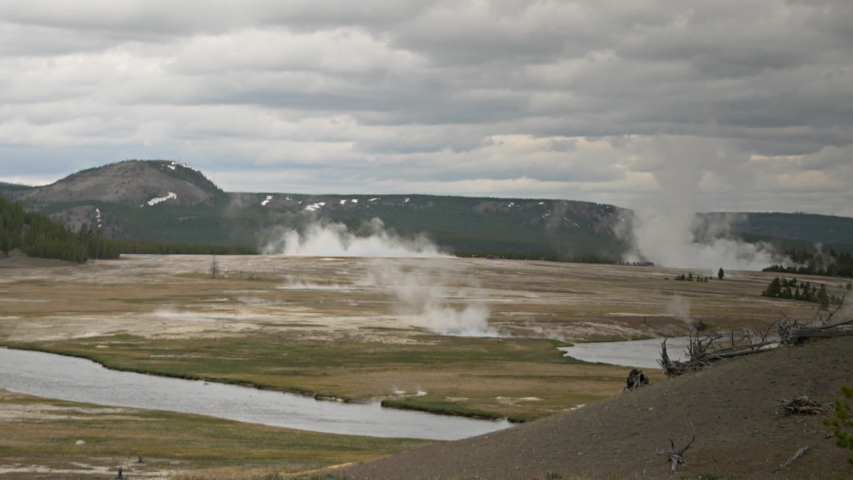Yellowstone national park footage of various geysers and waterfalls 