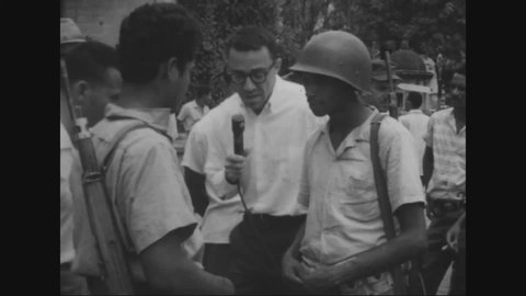 CIRCA 1965 - An American reporter stationed in the Dominican Republic dispels rumors of communism taking over the rebellious side of the Civil War.