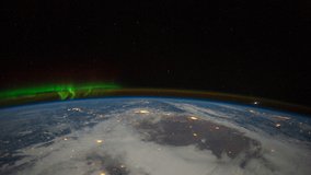 Planet Earth seen from the International Space Station with Aurora Borealis over Central US , Time Lapse . Images courtesy of NASA Johnson Space Center. 