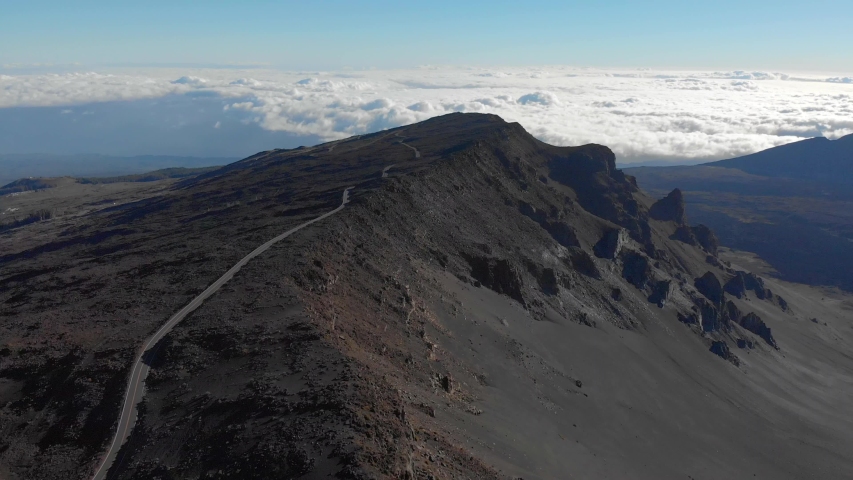Drone going Backwards. Aerial Reveal of Main Road in Haleakala National Park.