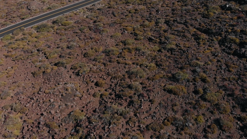 Aerial Tilt Up Reveal of Haleakala National Park and themMain Road.