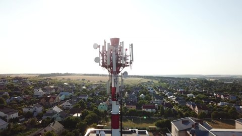 Telecommunication tower of 4G and 5G cellular. Base Station or Base Transceiver Station. Wireless Communication Antenna Transmitter. Telecommunication tower with antennas against blue sky.