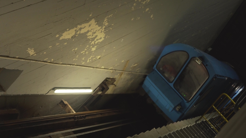 Cable car that runs in the tunnel inside the mountain Gaustatoppen - Norway, train is approaching