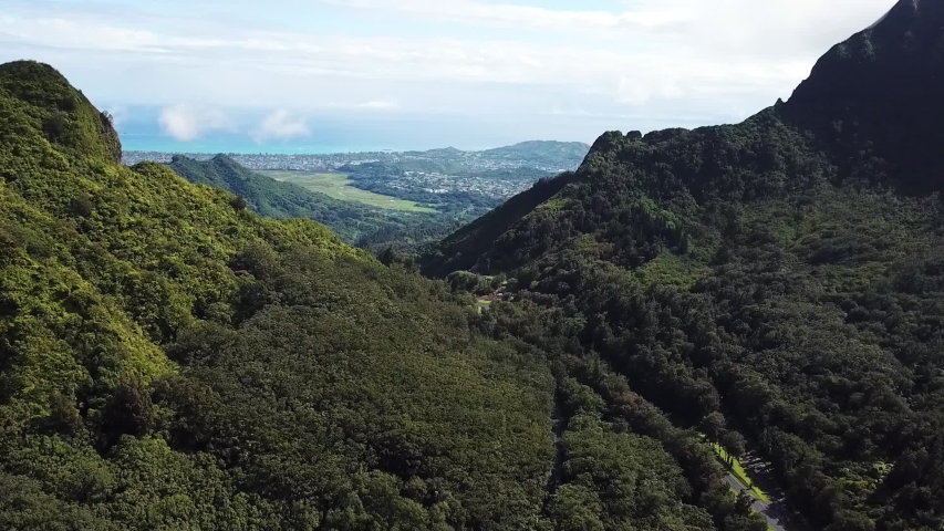 Magical Landscape of Oahu Island Hawaii Cinematic Aerial. Tropical Rainforest Volcanic Cliffs and Green Valley