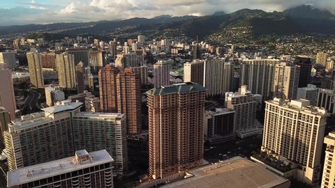 Honolulu Hawaii Downtown Condo Buildings Hotels and Harbor Marina Pier Cinematic Aerial Overview