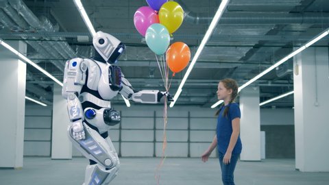 Modern robot gifts balloons to a little girl, side view.