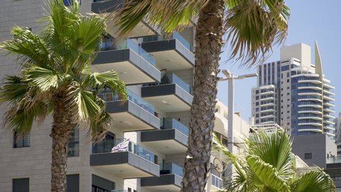 Luxury resort hotel apartment with balcony and palm near beach in Tel Aviv Israel