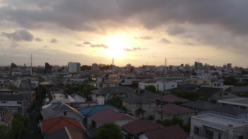 Aerial shot of Tokyo city during sunset, concrete jungle all over the horizon