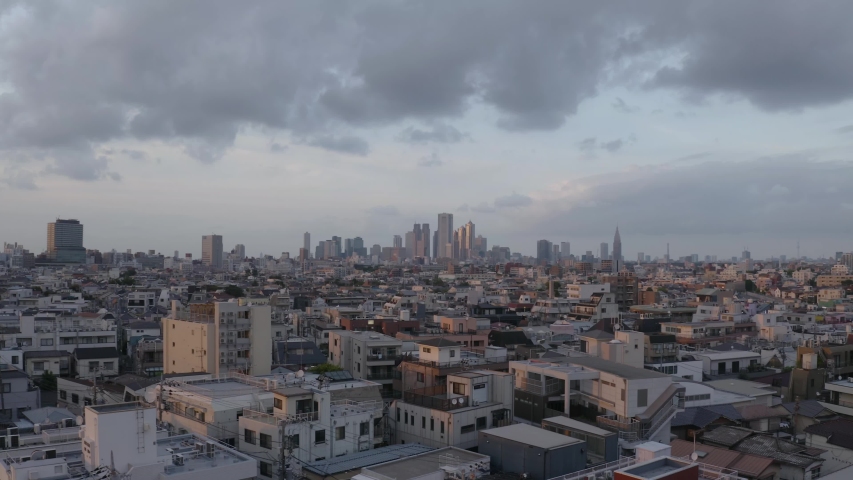Aerial shot of Tokyo city during sunset, concrete jungle all over the horizon