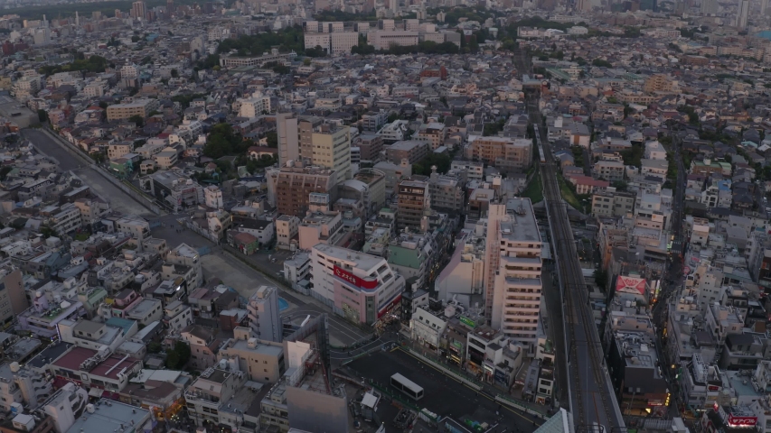 Aerial shot of Tokyo city during sunset, concrete jungle all over the horizon