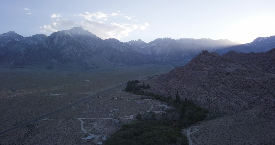 Alabama hills on sunset, aerial dolly in shot over campsite, lone pine, California