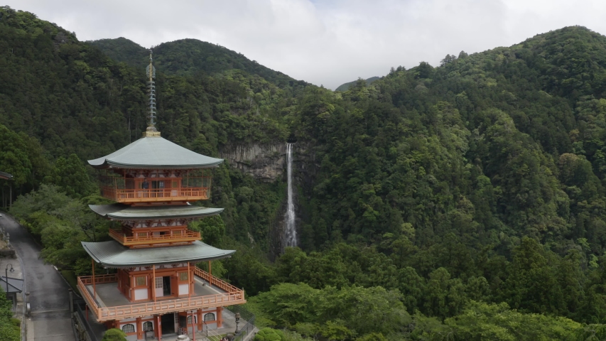 Drone shot of Nachi Taisha waterfall, the biggest of Japan, on the Kumano dodo trail Royalty-Free Stock Footage #1033637384