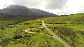 An aerial video of a road leading up to Muckish mountain in Donegal Ireland.