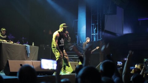 MOSCOW-22 NOVEMBER,2015:Video from concert of American rap band Crazy Town in nightclub.Singer Seth Binzer known as Shifty Shellshock performing biggest hit song Butterly on scene in the club
