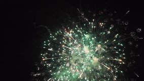 Beautiful fireworks show on christmas day. The greatest of fireworks on celebration day. clip of wonderful of fireworks for background. Magnificent holiday fireworks in celebration concept.