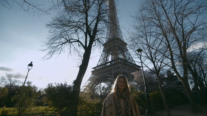 Beautifu Girl In Paris With Eiffel Tower On Background
