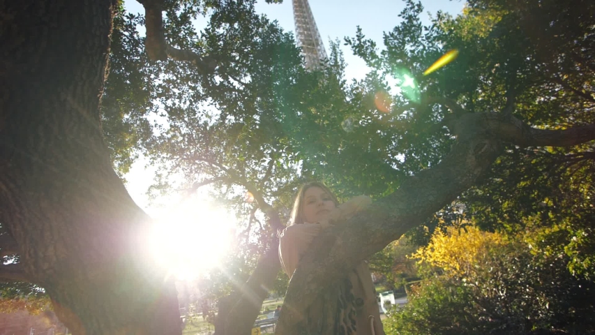 Beautifu Girl In Paris With Eiffel Tower On Background