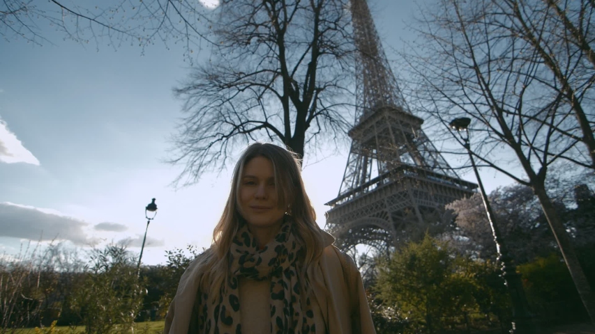 Beautifu Girl In Paris With Eiffel Tower On Background