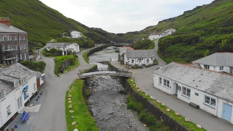 Drone footage above the River Valency in the picturesque fishing village of Boscastle in Cornwall, South England.