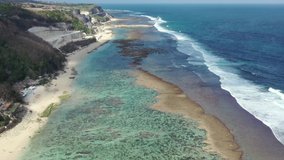 Aerial video on Bali island, Indonesia. Beautiful lagoon and clear ocean.