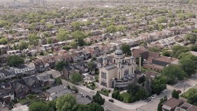 Aerial Establishing shot of a Toronto neighborhood during the summer. Cinematic 4K footage.