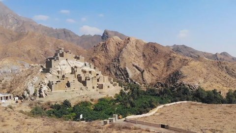 Dhy Ain Village, Al-Baha, Saudi Arabia. (aerial photography) about 20 kilometers from Manhwa and 24 kilometers from Bach. It originated in AH in the 10th century and lasts more than 400 years.