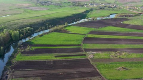 Flying over scenery russian plots of arable lands near river Sok in Samarskaya oblast