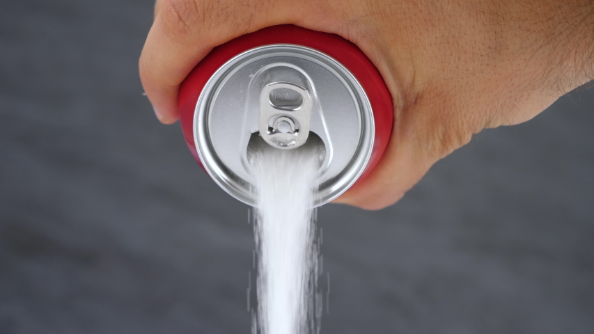 Unhealthy food concept, sugar in carbonated drinks. High amount of sugar in beverages. Shot in 4K | Shutterstock HD Video #1033725713