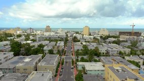 Aerial drone footage of Miami Beach 11th Street facing eastbound