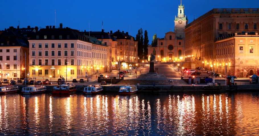 Stockholm, Sweden. Scenic Night View Of Embankment In Old Town Of Stockholm At Summer. Gamla Stan In Summer Evening. Famous Popular Destination Scenic Place And UNESCO World Heritage Site
