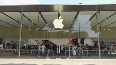AIX EN PROVENCE, FRANCE - CIRCA July 2019: Transparent Apple store front in France with famous logo. People shopping inside