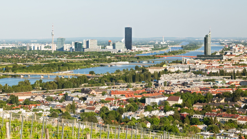 Timelapse view from a vineyard hill over Vienna, Austria to the Danube river, International Centre and Donaucity.
