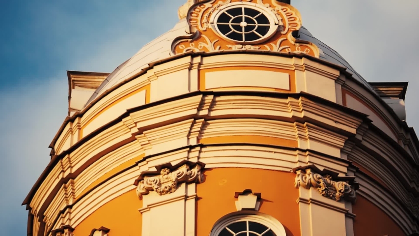 Orthodox christian church with cross on top on sunny day. Camera sliding on top. Slow motion. Alexander Nevsky Lavra, Saint-petersburg, Russia.