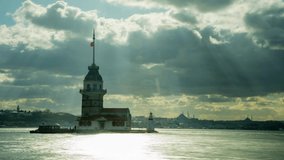 Timelapse video of Maiden's Tower and old Istanbul on a cloudy day with changing lights.