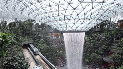 SINGAPORE-MAY 22, 2019_The HSBC Rain Vortex, the world's largest indoor waterfall at 40m tall, in Jewel Changi Airport, a mixed-use development at Changi Airport in Singapore, opened on 17 April 2019