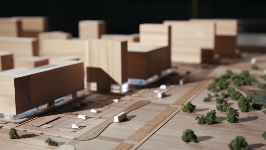 Miniature Residential Quarter with Detailed Planning from Wood Objects. The Concept of a Healthy Lifestyle for Residents in Town. Constructor in the Form of a Green Area With Shrubs, Pond and Parking